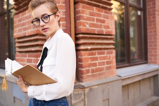 pretty woman on the street near the building rest Lifestyle photo