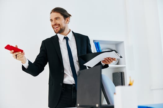 businessman holding a phone telephone office technologies photo