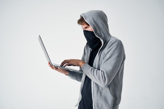 male thief hooded head hacking technology security isolated background photo