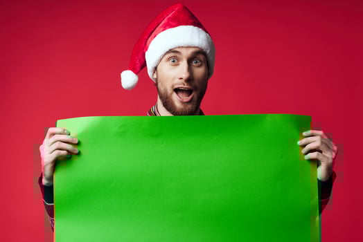 emotional man in New Year's clothes advertising copy space red background photo