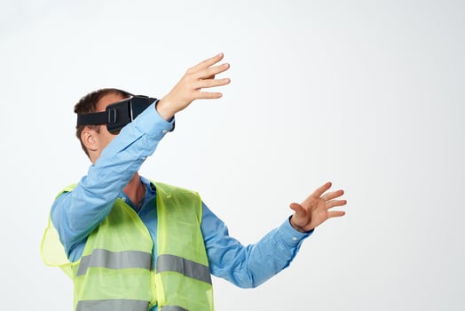 construction worker in working form blueprints virtual reality glasses construction photo