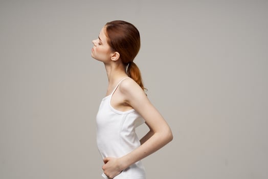 woman groin pain intimate illness gynecology light background photo