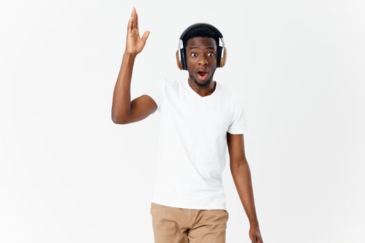 man wearing headphones surprised facial expression music lifestyle photo