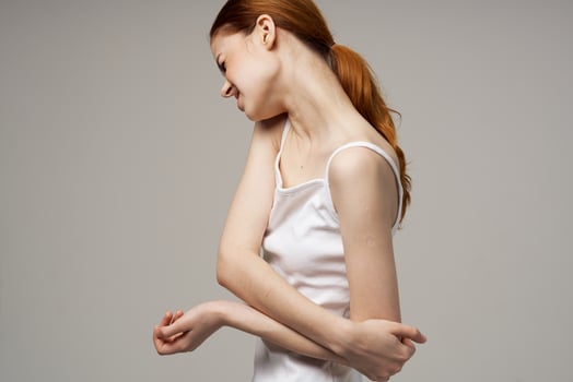 woman elbow pain arthritis chronic disease isolated background photo