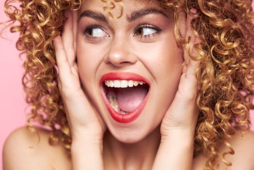Charming model wide open mouth smile bright makeup photo