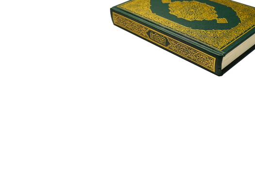 The Holy Al Quran with written arabic calligraphy meaning of Al Quran and rosary beads or tasbih on white background, isolated with copy space. photo