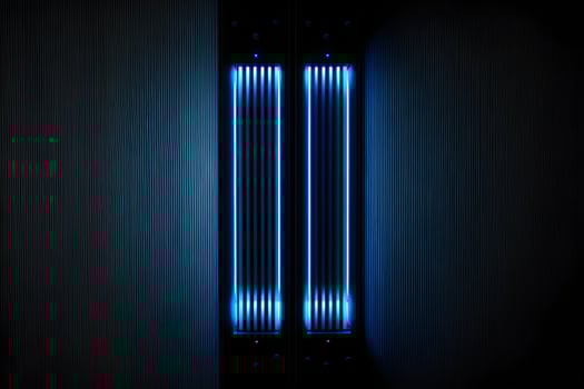 blue led light with black background made by technology photo