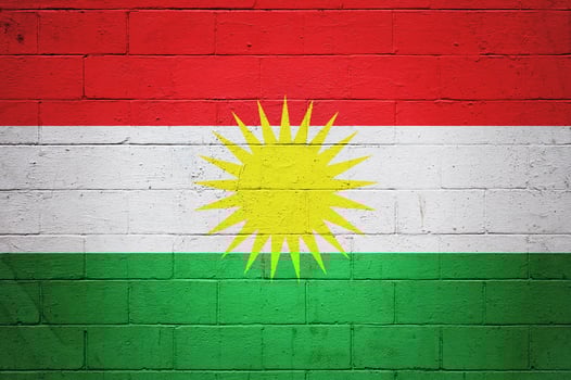 Flag of Kurdistan painted on a wall photo