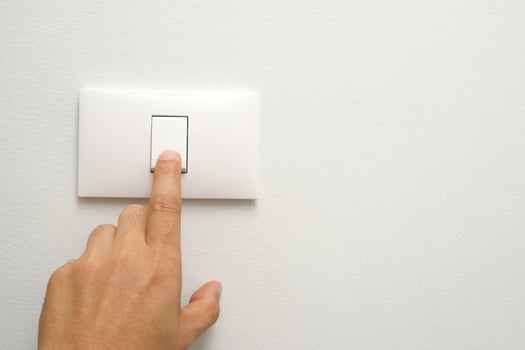 Turn on-off the light switch. to save electricity photo
