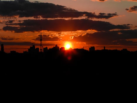 Autumn red sunset with a purple sky photo
