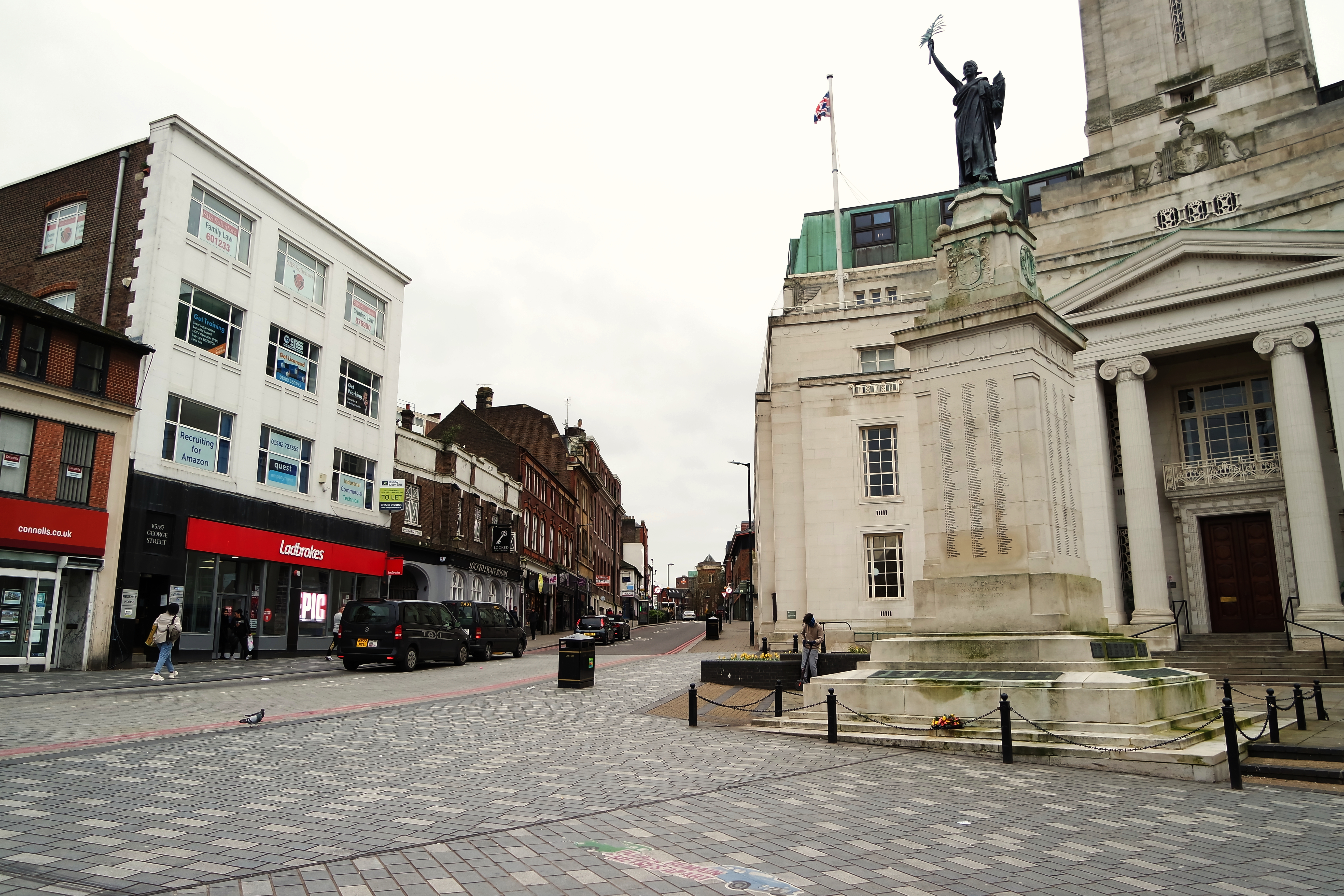 Low Angle View of Downtown City Center of British City London Luton Town of England UK. The Image Was Captured at Central Luton  City During a Cold and Cloudy Evening of 01-April-2023 photo
