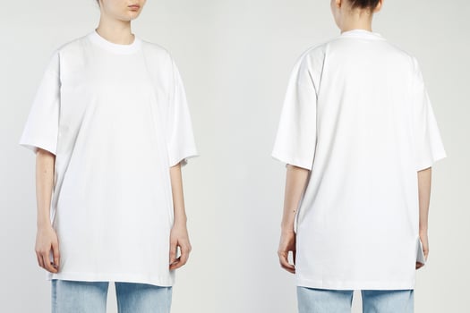 A woman wears a white over size t shirt photo