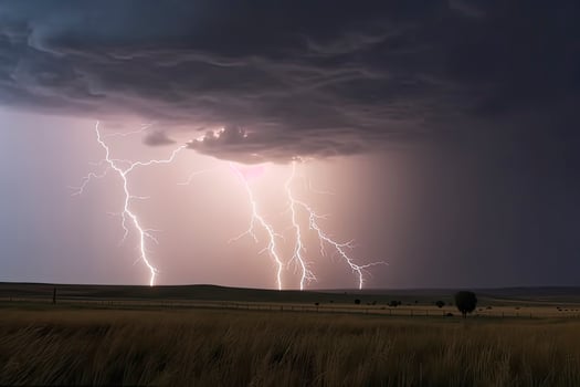 dramatic lightning thundertbolt bolt strike in daylight rural surrounding bad weather dark sky photo