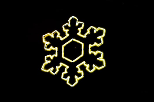 christmas festive shining star on a black background photo