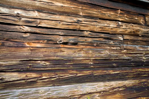 old wooden brown boards forming an original natural background photo
