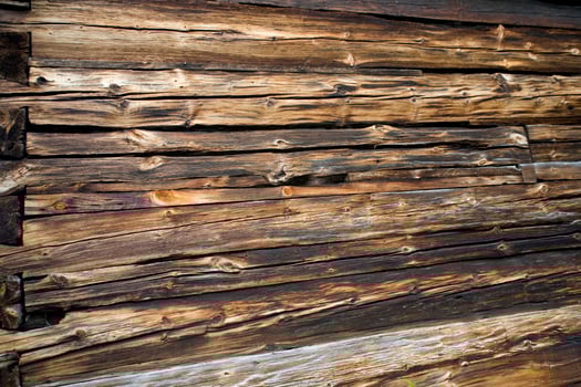 old wooden brown boards forming an original natural background photo