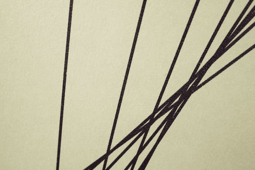 black nteresting straight lines on a beige background, photo