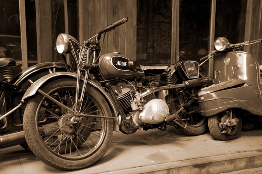 original old vintage retro vintage motorbikes standing in the museum photo
