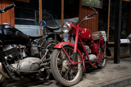 original old vintage retro vintage motorbikes standing in the museum photo