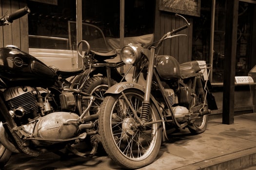 original old vintage retro vintage motorbikes standing in the museum photo