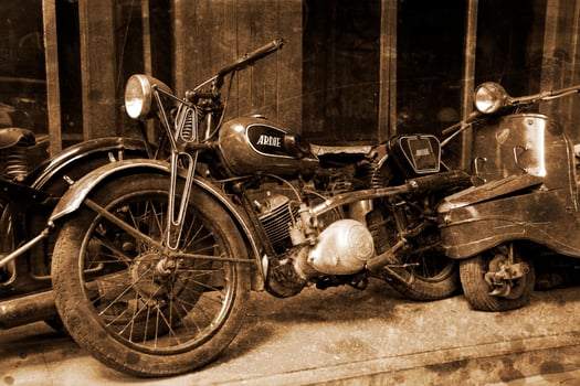 original old vintage retro vintage motorbikes standing in the museum photo
