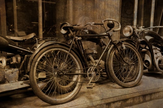 original old vintage retro vintage motorbikes standing in the museum photo