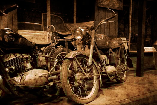 original old vintage retro vintage motorbikes standing in the museum photo