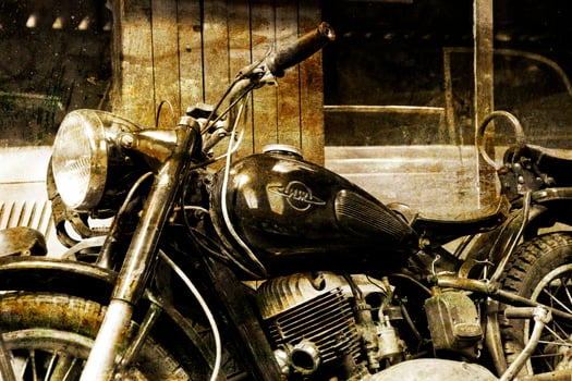 original old vintage retro vintage motorbikes standing in the museum photo