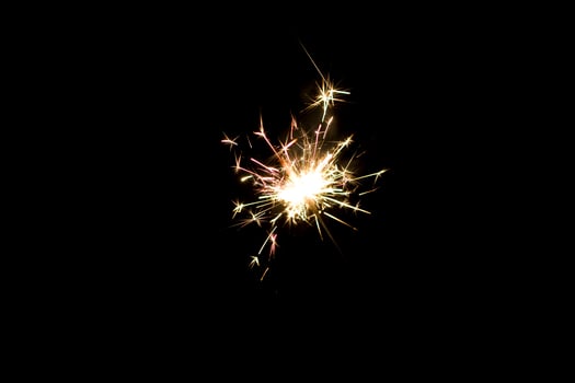 sparklers on a black background photo