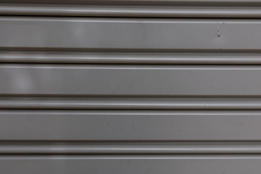 interesting original gray metal background in close-up photo