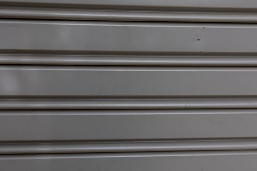 interesting original gray metal background in close-up photo