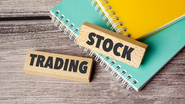 stock trading symbol. Concept words we payday loans on wooden blocks. photo