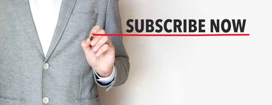 subscribe now words made with marker and businessman photo