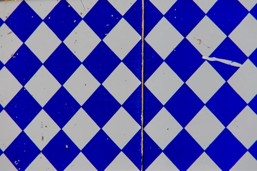 blue and white terracotta glaze tiles in spain traditional decoration background photo