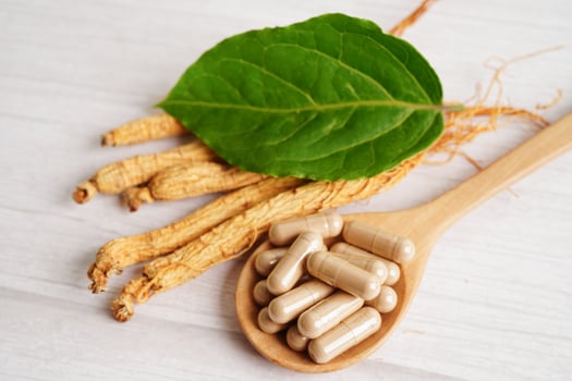 Ginseng roots and green leaf, healthy food. photo