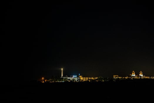 night view of the Maspalomas lighthouse in Spain in the Canary Islands photo
