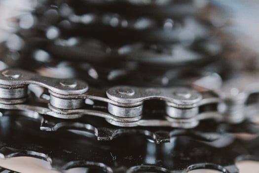 black gear wheel with bicycle chain photo