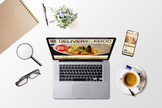 ordering take away food by internet with a laptop, food delivery photo