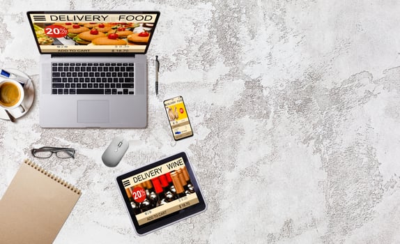 ordering take away food by internet with a laptop, food delivery photo
