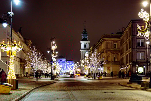 streets at night with decorations for Christmas Warsaw Poland in the city center photo