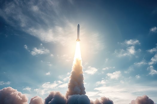 Rocket launch from cosmodrome. Fight of space rocket in blue sky. Space mission. photo