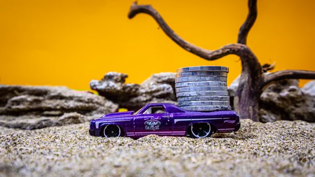minahasa, Indonesia  January 2023, Toy car carrying coins photo