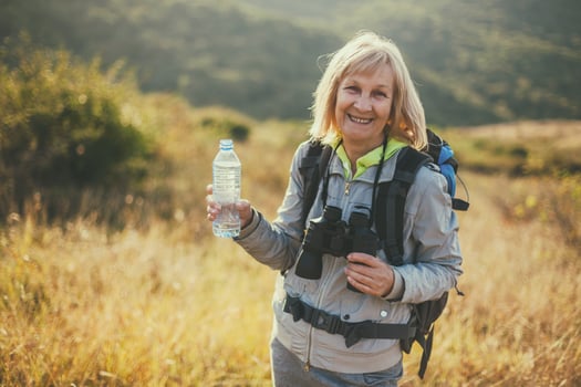 A senior woman hiking photo