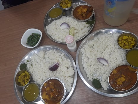 Traditional food of Bangladesh is rice and curry photo