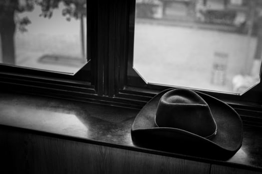 cowboy hat on windowsill photo