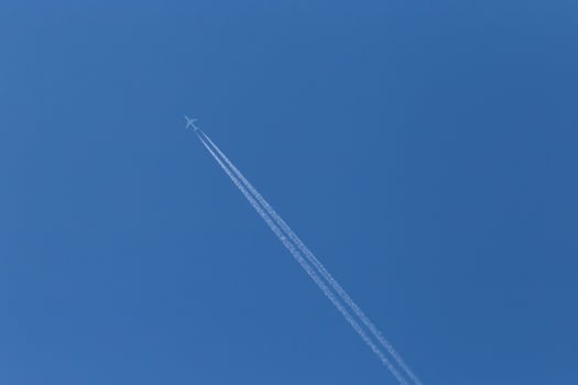 track from plane in a blue sky photo