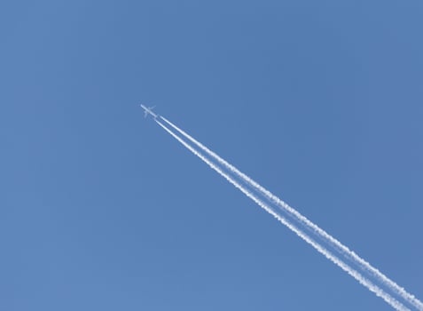 trace from plane in a blue sky photo