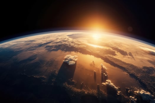 The rising sun above the earth as seen from space created with technology. photo