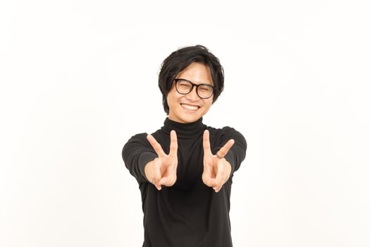 Smile and Showing Peace Sign Of Handsome Asian Man Isolated On White Background photo