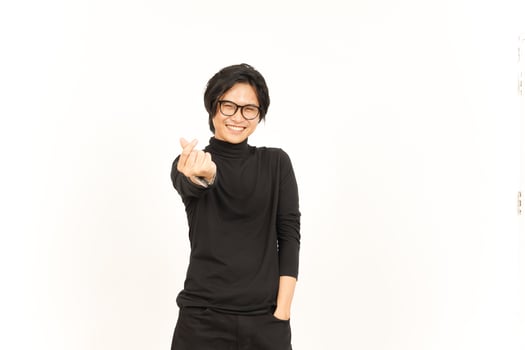 Smile and Showing Korean love finger Of Handsome Asian Man Isolated On White Background photo